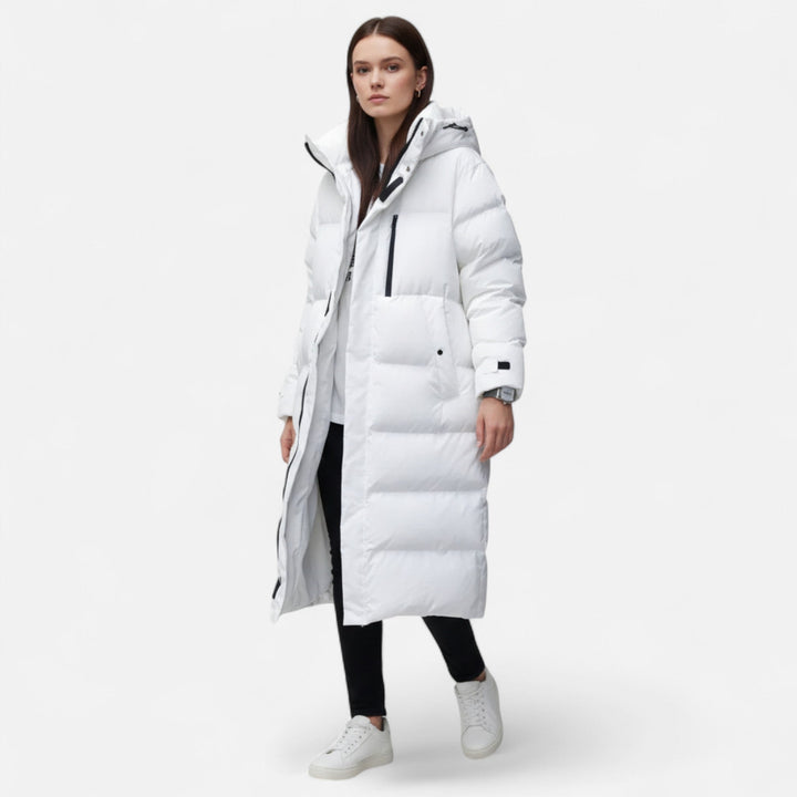 Weatherproof long puffer jacket for women. Stay warm and dry in this stylish winter coat.