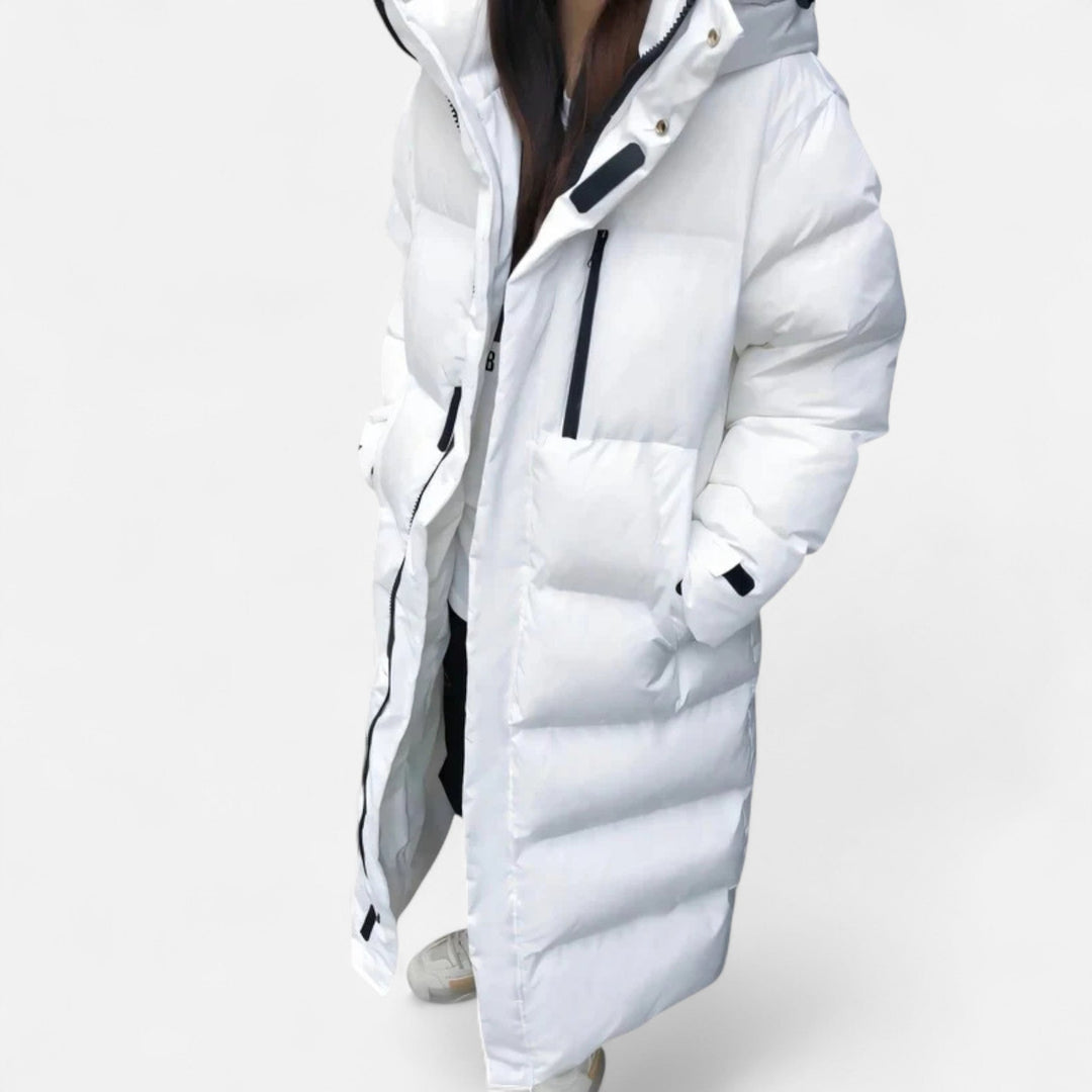 Warm & elegant women's long puffer jacket. Weatherproof outerwear for comfortable cold weather fashion.