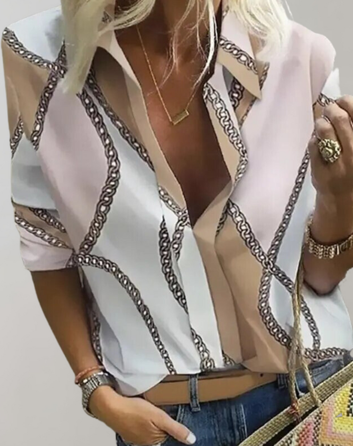 Stylish women's chain pattern blouse, a versatile long-sleeve top for various occasions, from office to casual.