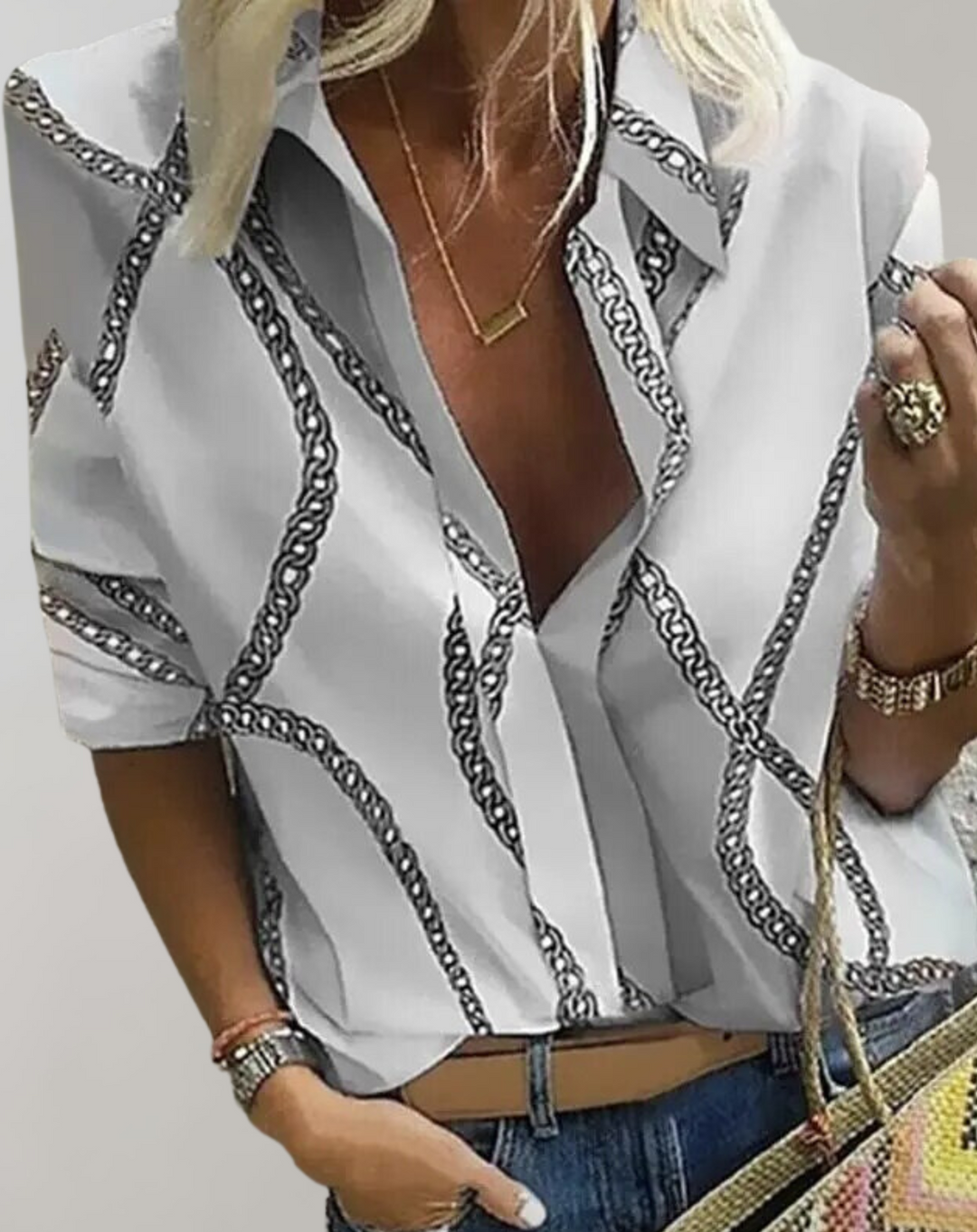 Modern women's long sleeve blouse featuring a unique chain pattern, offering comfort and style for daily wear.