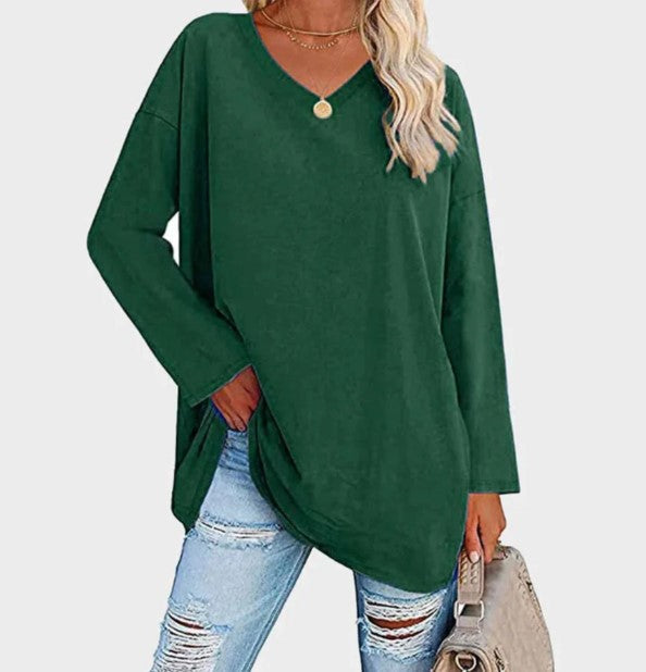 Women's long sleeve knit sweater, elegant design for versatile casual wear.