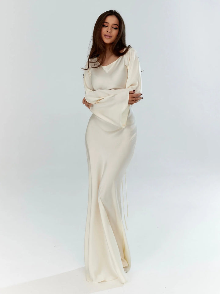 Elegant women's long sleeve maxi dress for evening events. Perfect formal gown for special occasions.