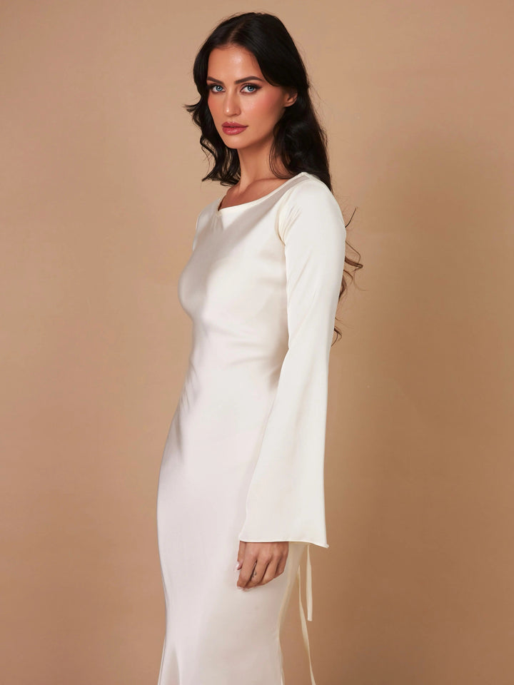 Luxurious long sleeve maxi dress, an elegant women's gown for formal occasions and celebrations.