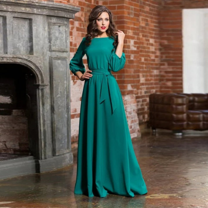 Formal long sleeve party dress for women, ideal for an evening event or as a wedding guest.