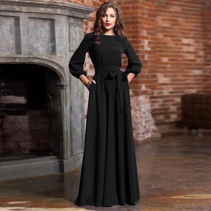 Stylish women's elegant midi dress with long sleeves, suitable for a sophisticated wedding.