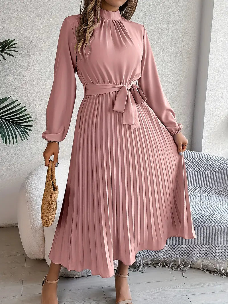 Women's long sleeve belted maxi dress in a vibrant color, offering a blend of formal & casual chic.