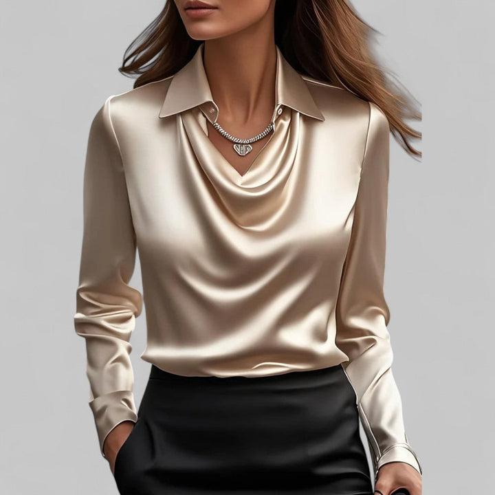 Stylish long sleeve satin blouse for women, featuring an elegant draped neckline and silky texture.