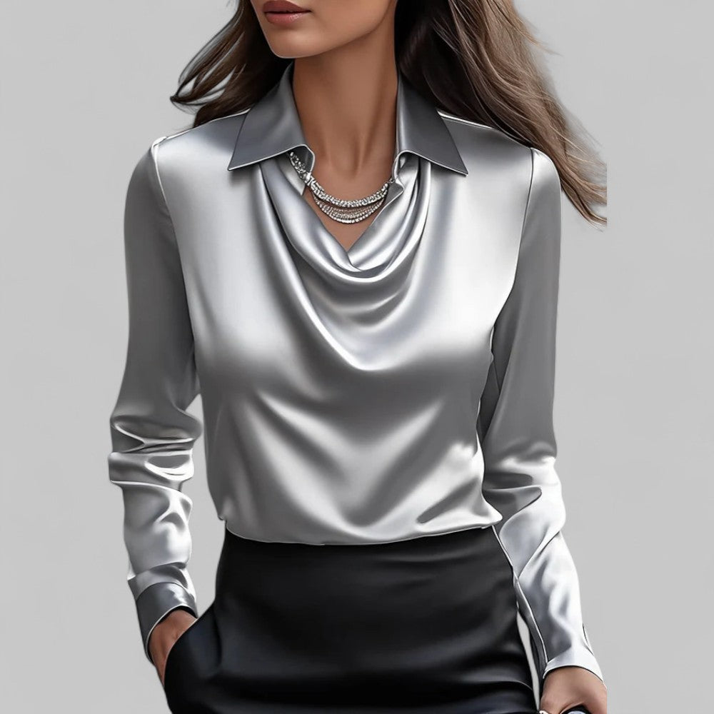 Silky long sleeve women's satin blouse, a fashionable and elegant top for party or professional settings.