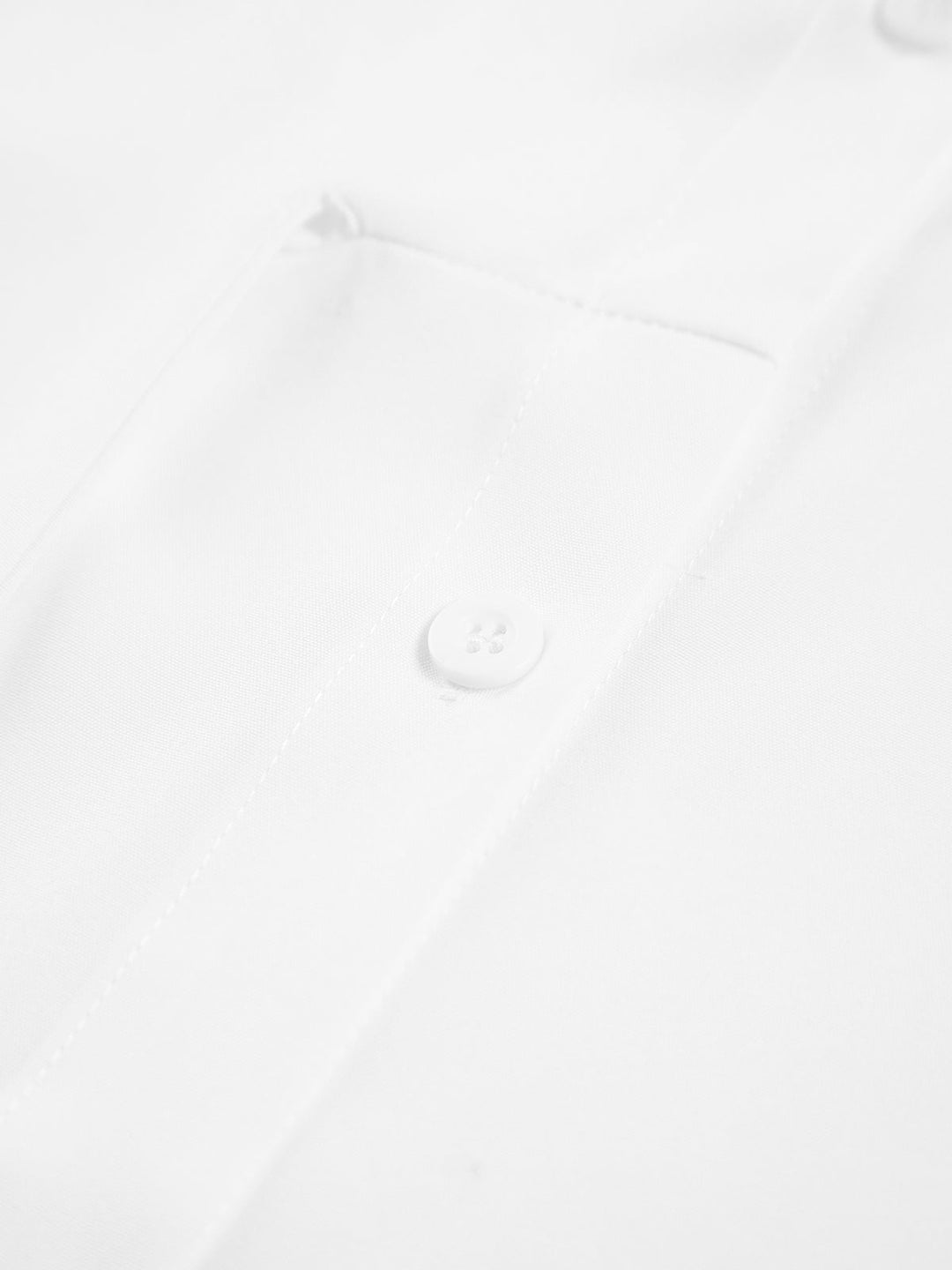 Chic women's shirt featuring a tie belt for a flattering silhouette, a timeless and elegant fashion piece.
