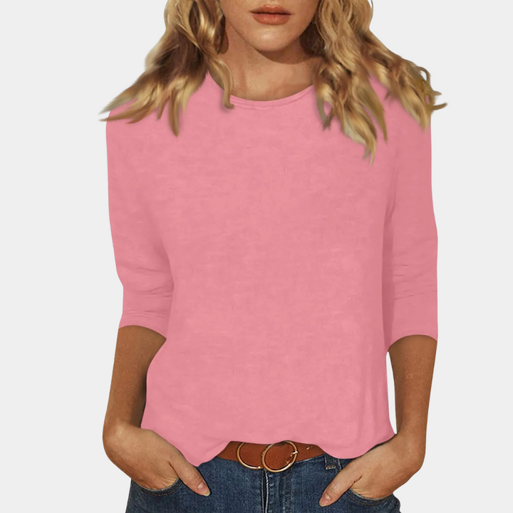 Elegant women's long sleeve t-shirt in soft fabric for comfort. Available in pink, white, purple, blue & black.