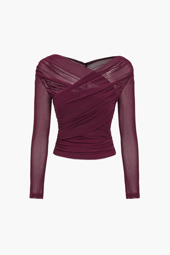 Fitted stretch long sleeve women's top. Flattering ruched cross-front design for comfort and elegant style.