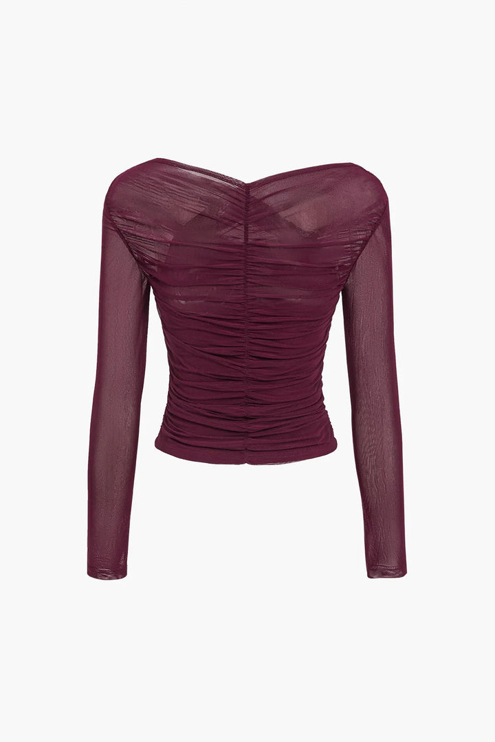 Elegant women's ruched cross-front long sleeve top, perfect for a sophisticated, refined look. Fitted blouse.
