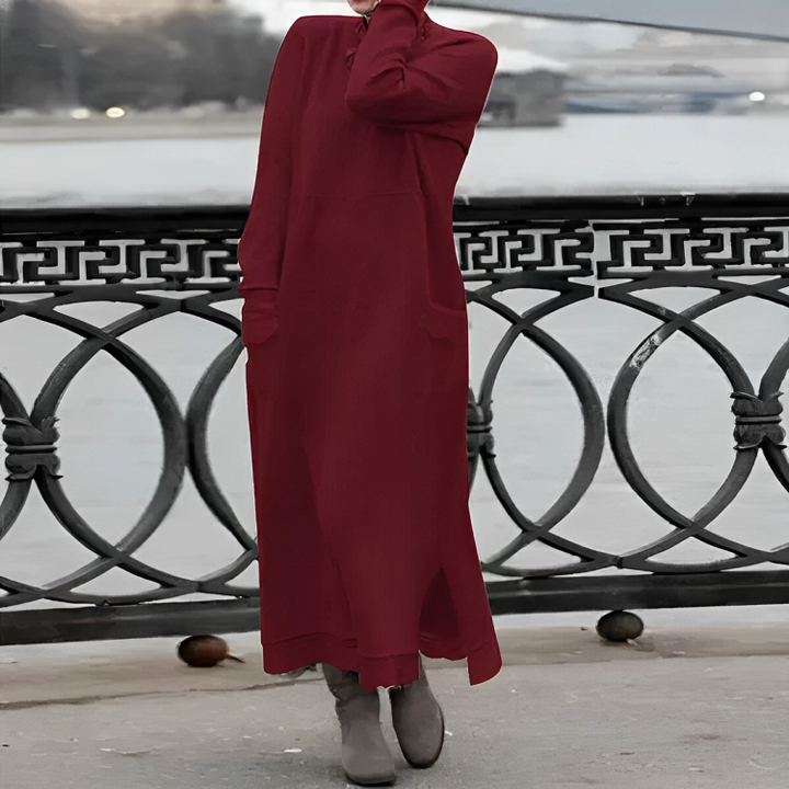 Stylish Greta long sleeve midi dress in a cozy fabric, ideal for comfortable maternity or winter fashion.