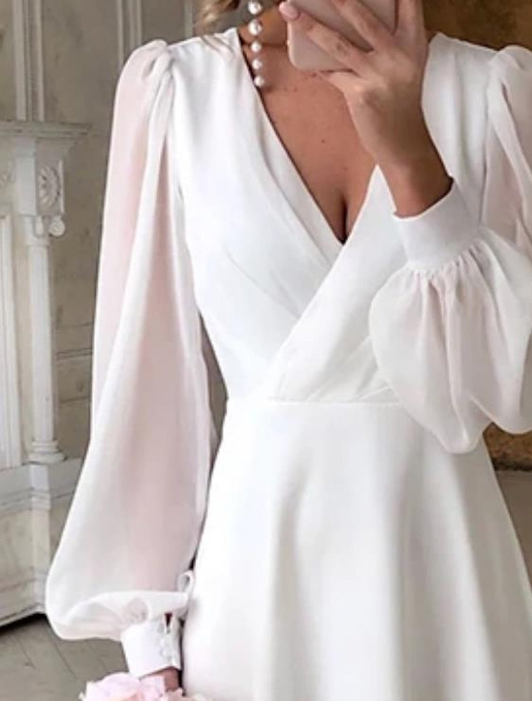 Stylish women's long sleeve chiffon cocktail dress, a chic and elegant midi option for any party or special occasion.