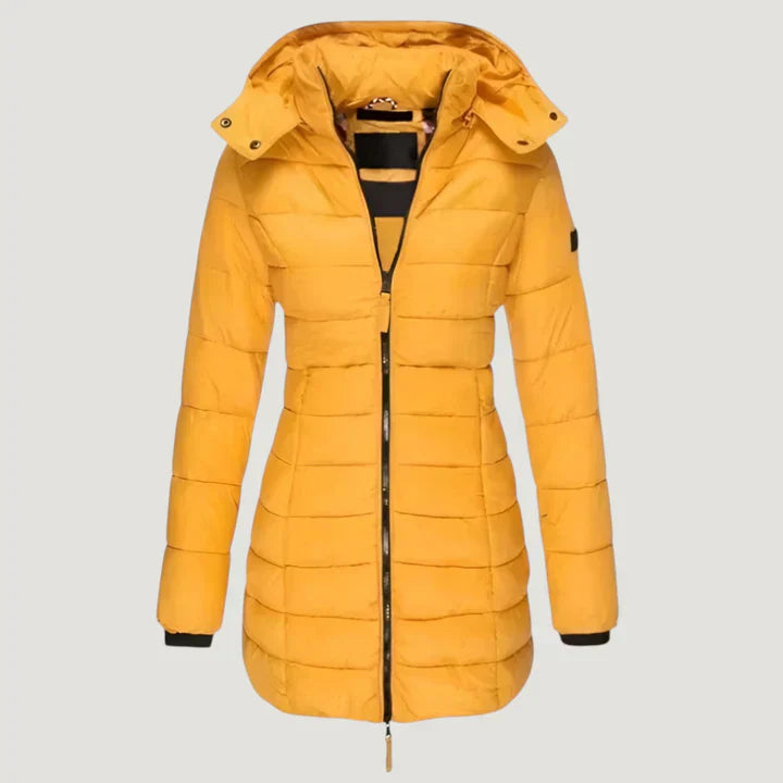 Stylish women's long winter coat, elegant and warm, designed for optimal comfort in cold weather.
