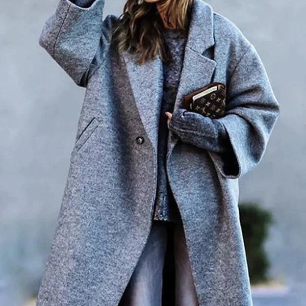 Elegant women's long winter coat, warm for chic cold-weather fashion.