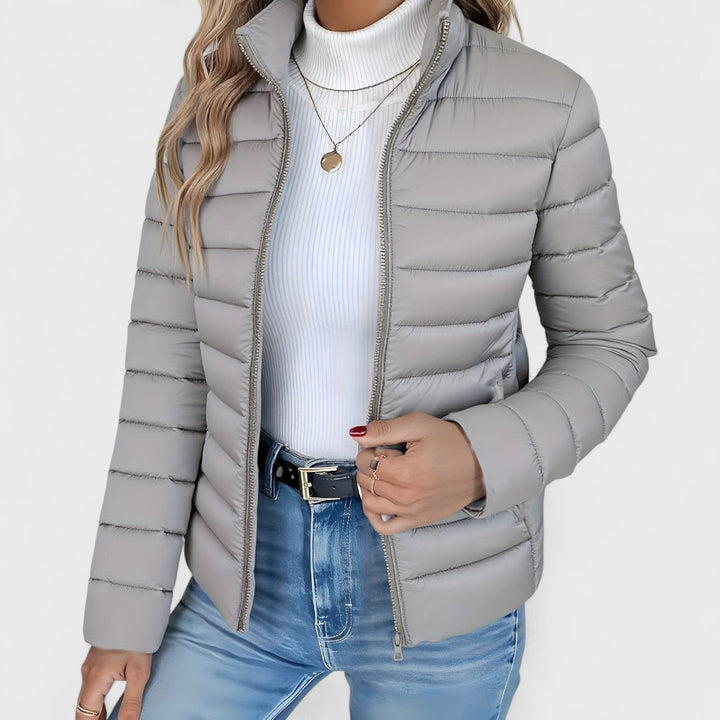 Designer women's longline quilted jacket, high collar for elegance, a must-have lightweight autumn jacket.
