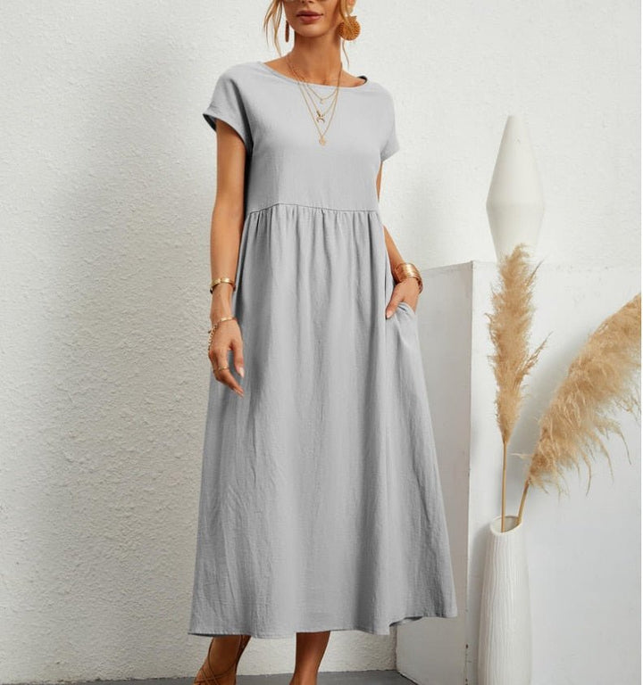Flowy women's summer maxi dress, breathable fabric for elegant comfort, perfect for spring fashion.