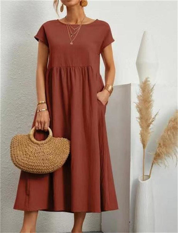 Chic women's maxi summer dress, offering breathable comfort and elegant style for warm weather.
