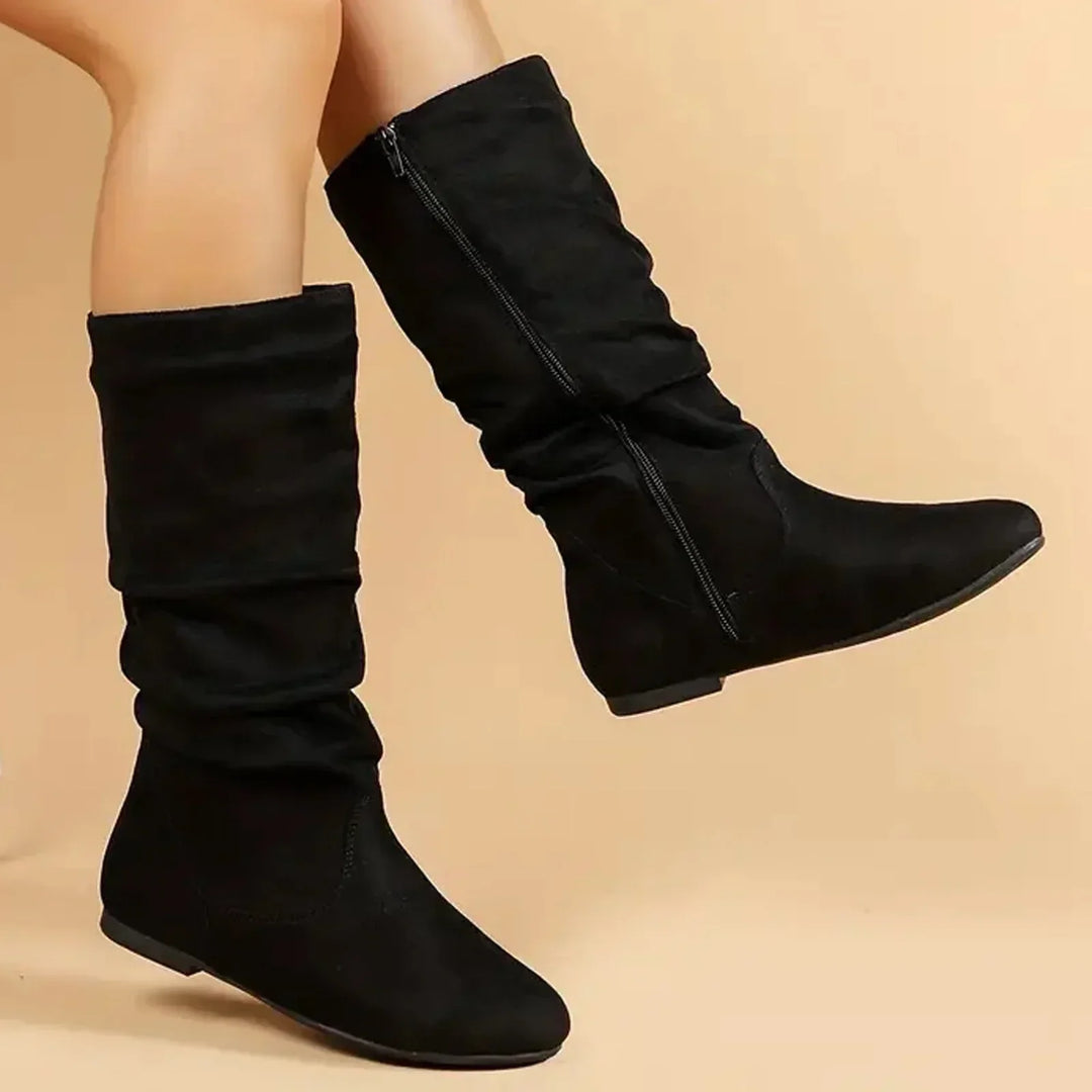 Chic women's mid-calf boots, ideal for elegant urban style. Features a modern design and functional side zipper.