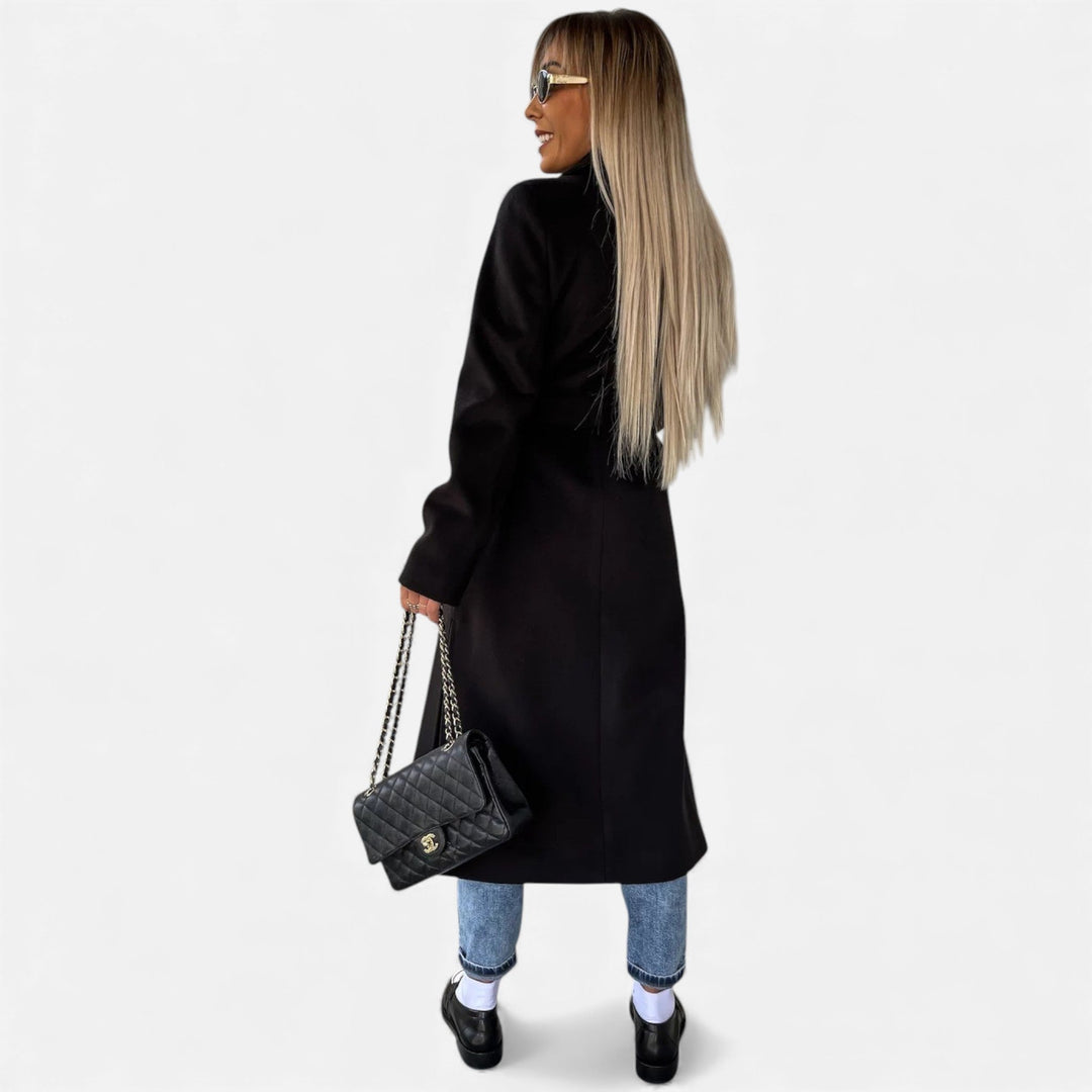 Trendy women's belted lapel overcoat. Mid-length elegant coat for sophisticated winter fashion.