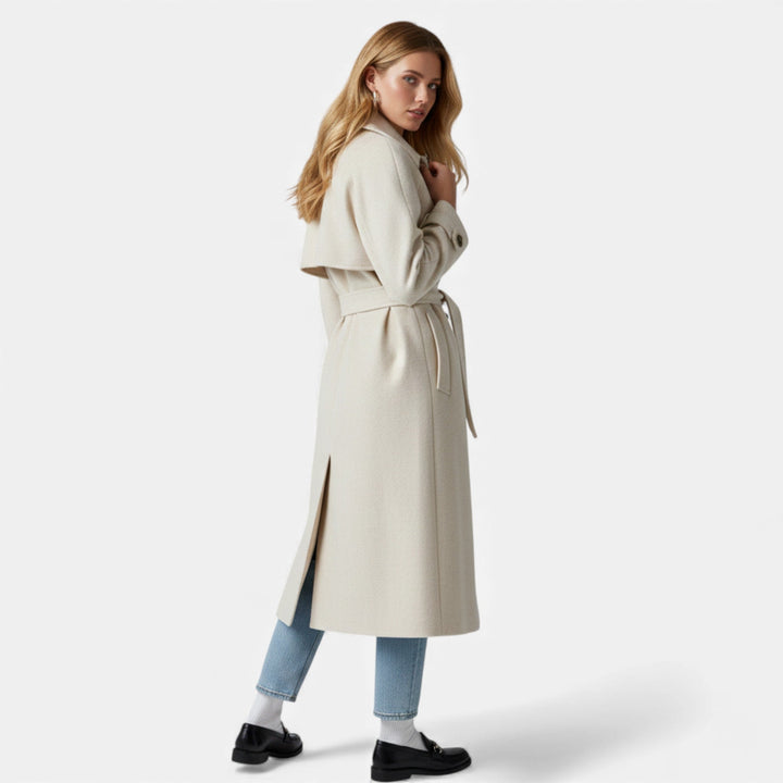 Chic women's lapel coat with belt. Mid-length elegant overcoat for winter fashion.