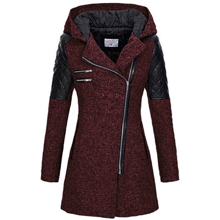 Women's mid-length puffer jacket, black, with a distinctive diagonal zipper, cold weather essential.