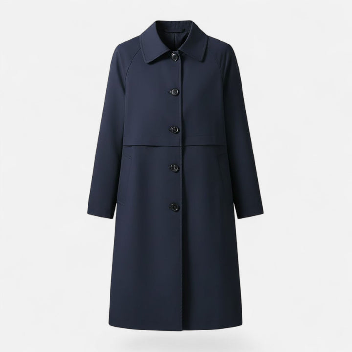 Classic belted women's trench coat in mid-length, offering an elegant silhouette for autumn fashion.