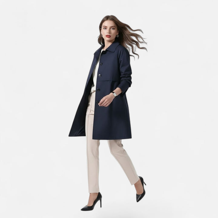 Sophisticated women's mid-length trench coat, versatile elegant outerwear for multiple seasons.
