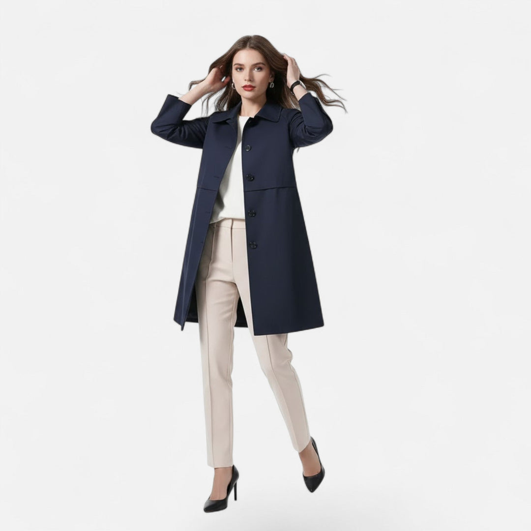 Women's all-season mid-length trench coat, an elegant outerwear piece for a timeless, versatile look.
