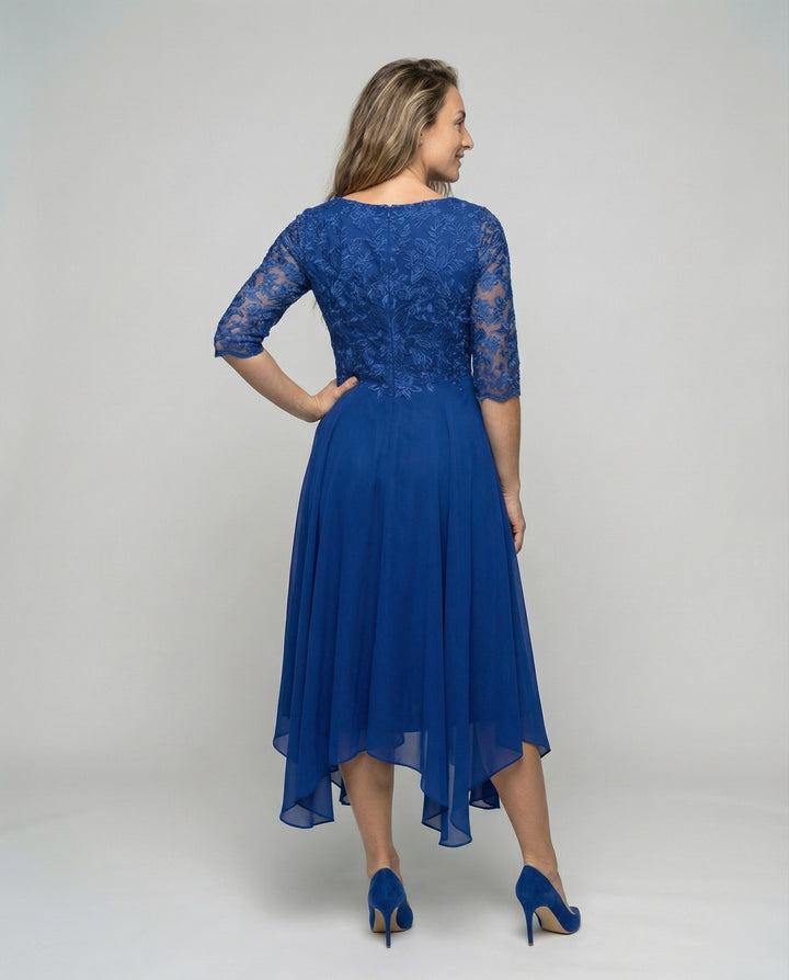 Standout women's midi dress, elegant & embroidered for truly special occasions & formal events.
