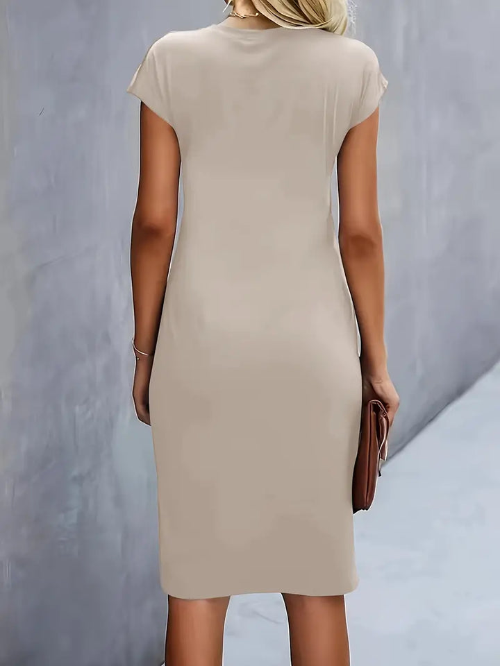 Stylish women's midi dress, elegant and timeless, suitable for summer casual or formal.