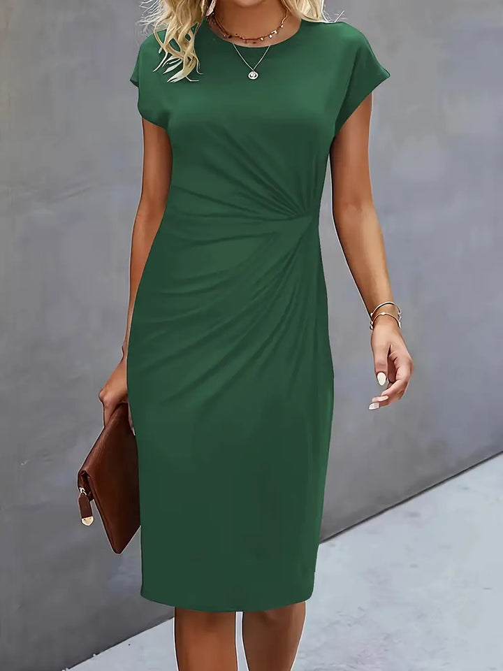 Timeless women's midi dress, an elegant and versatile wardrobe staple for summer.