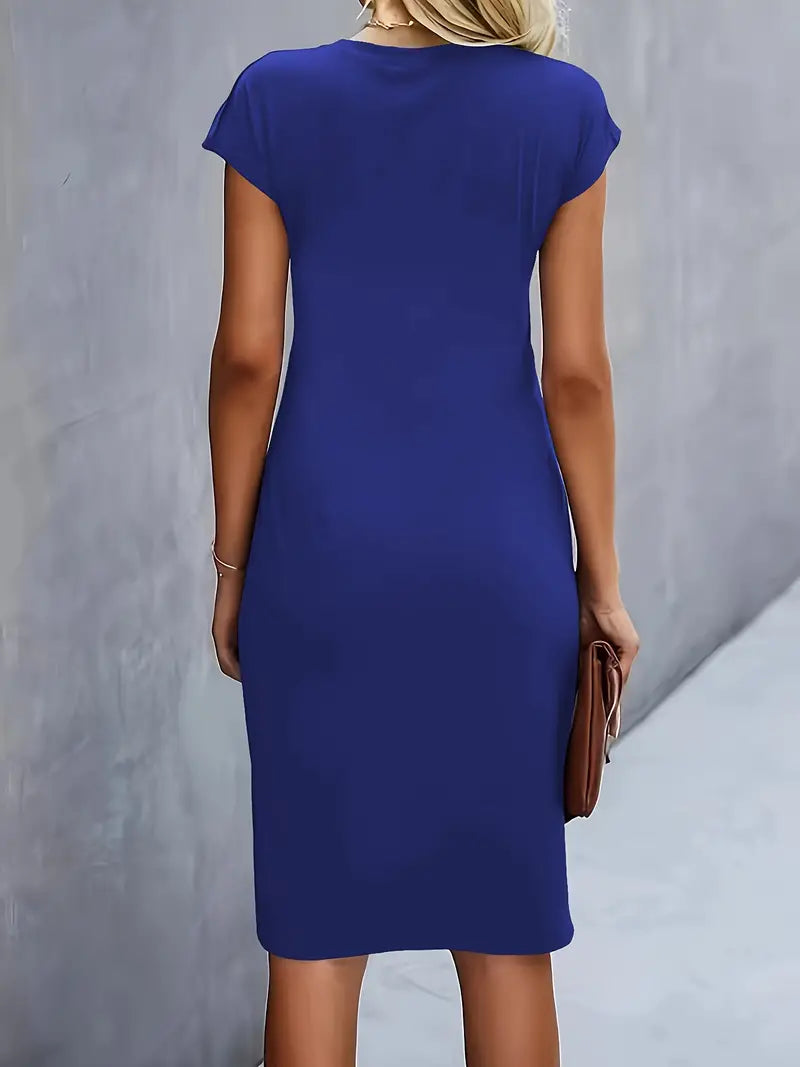 Women's midi dress, an elegant timeless staple, perfect for summer versatility.