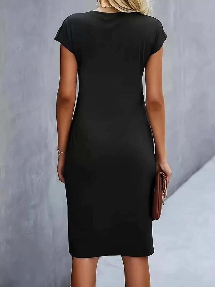 Classic women's midi dress, a versatile wardrobe staple for elegant summer fashion.