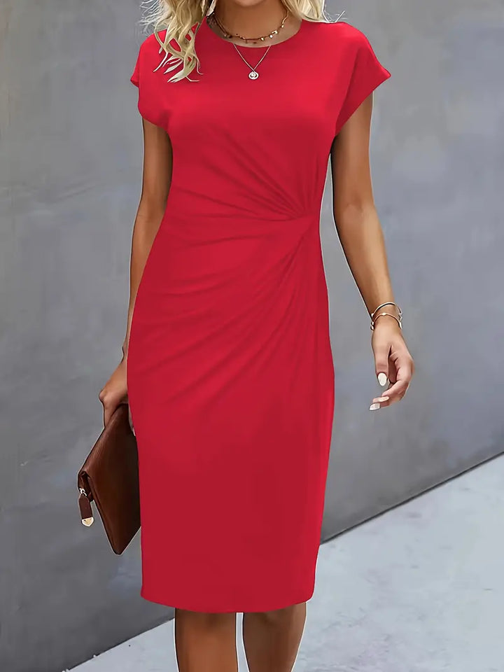 Timeless cut women's midi dress, an elegant and versatile piece for any occasion.