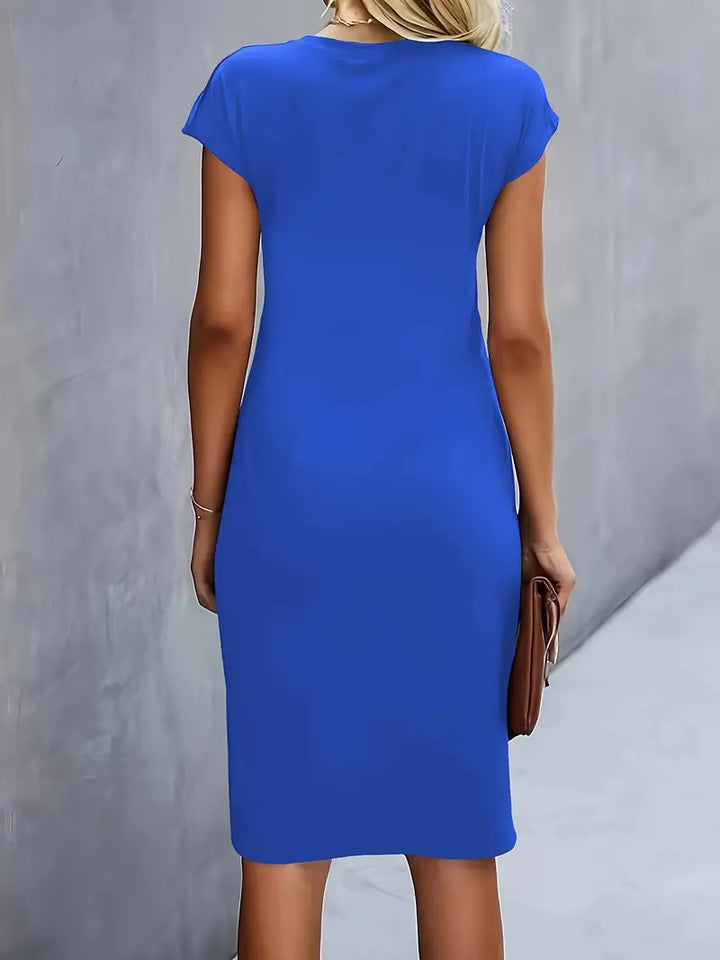 Classic women's midi dress with a timeless cut, ideal for an elegant summer look.