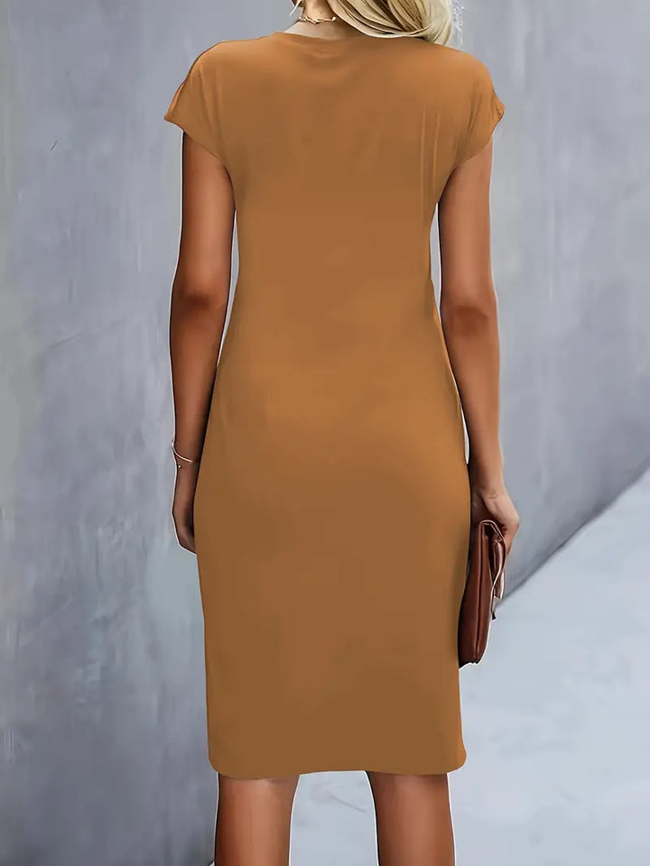 Elegant women's midi dress, a timeless summer essential for sophisticated style.