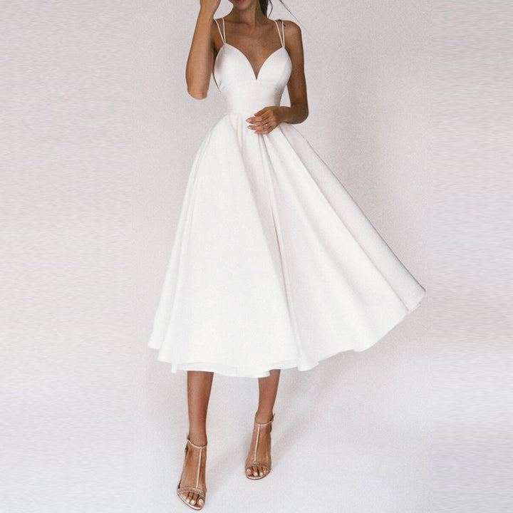 Elegant women's midi dress with a structured bodice & flowy flared skirt, perfect for cocktail parties or evening events.