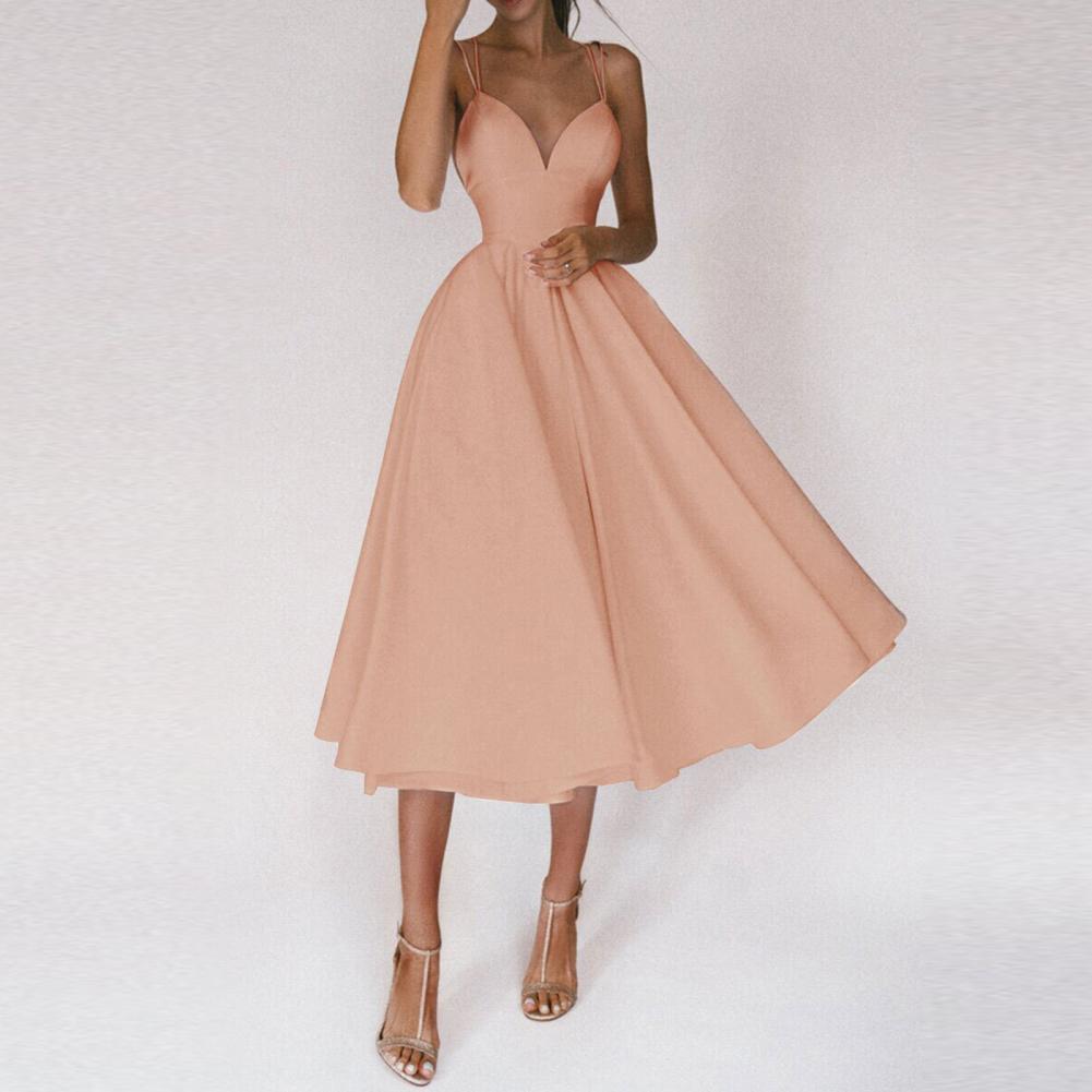 Stylish sleeveless women's midi dress with a structured top and an elegant flared skirt, ideal for summer or parties.