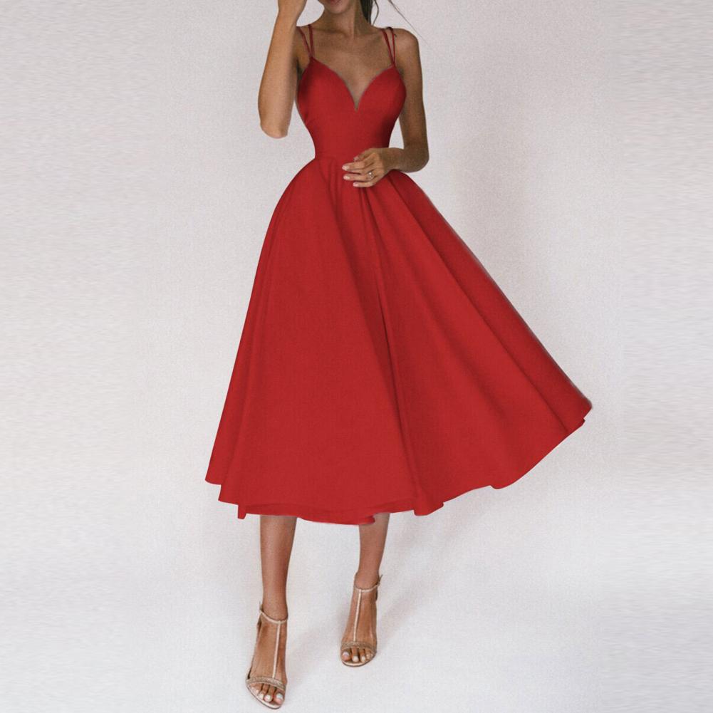 Chic women's party midi dress, sleeveless with a structured bodice and a full flared skirt, exuding sophisticated style.