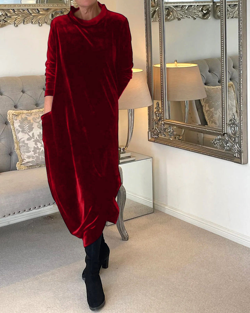 Women's comfortable elegant midi dress, perfect for all seasons, with long sleeves and pockets.