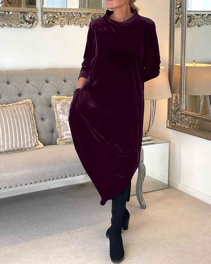 Feminine women's long sleeve dress with a classic round neck, elegant style & essential pockets.
