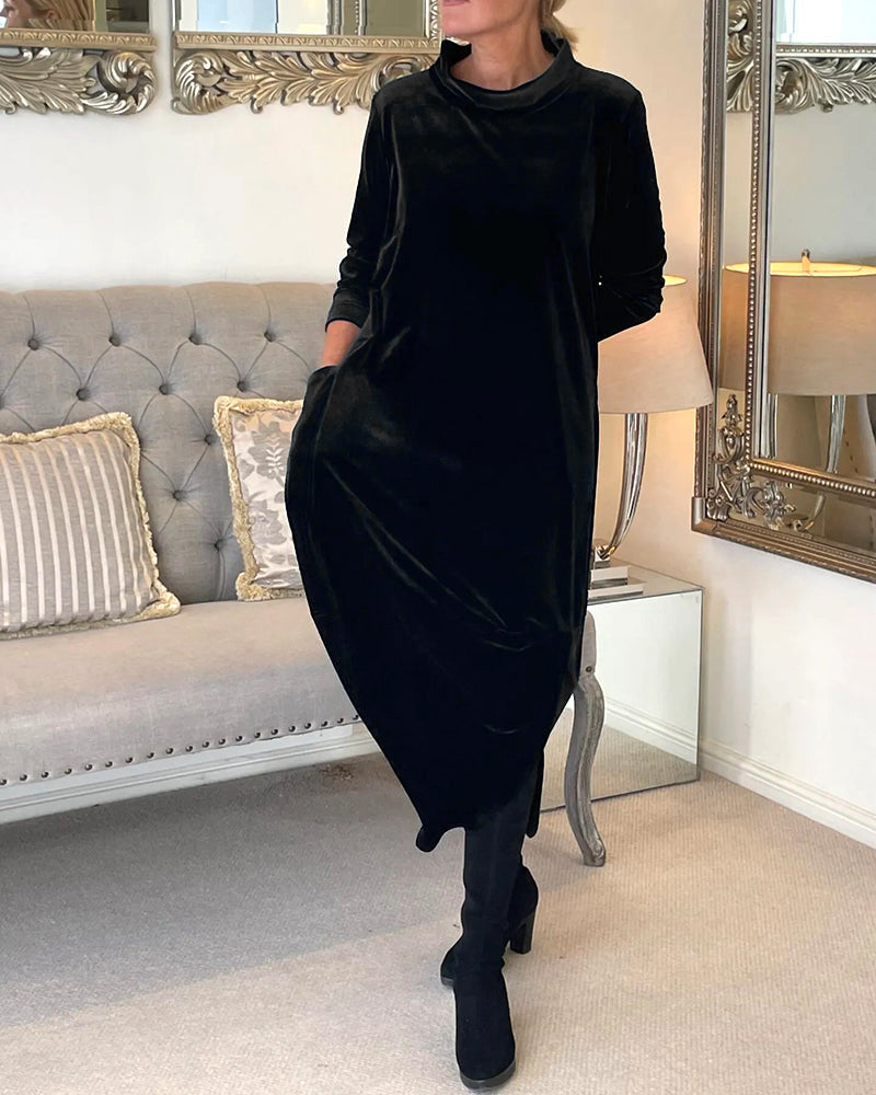Sleek women's long sleeve midi dress, features a round neck, elegant cut, and handy pockets.