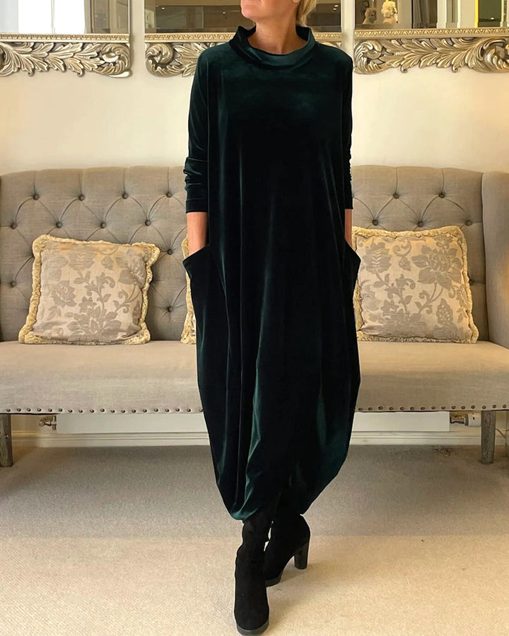 Stylish women's dress in a flattering silhouette, versatile midi length, long sleeves & pockets.