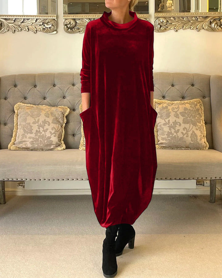 Elegant women's round neck dress, long sleeves, comfortable fabric, and practical side pockets.