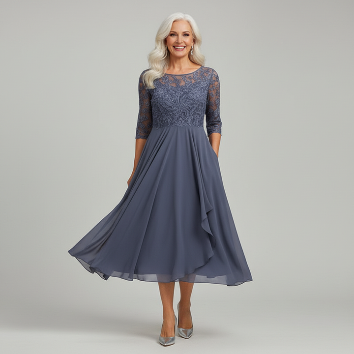 Formal women's midi dress, elegant design with three-quarter sleeves, suitable for evening wear.