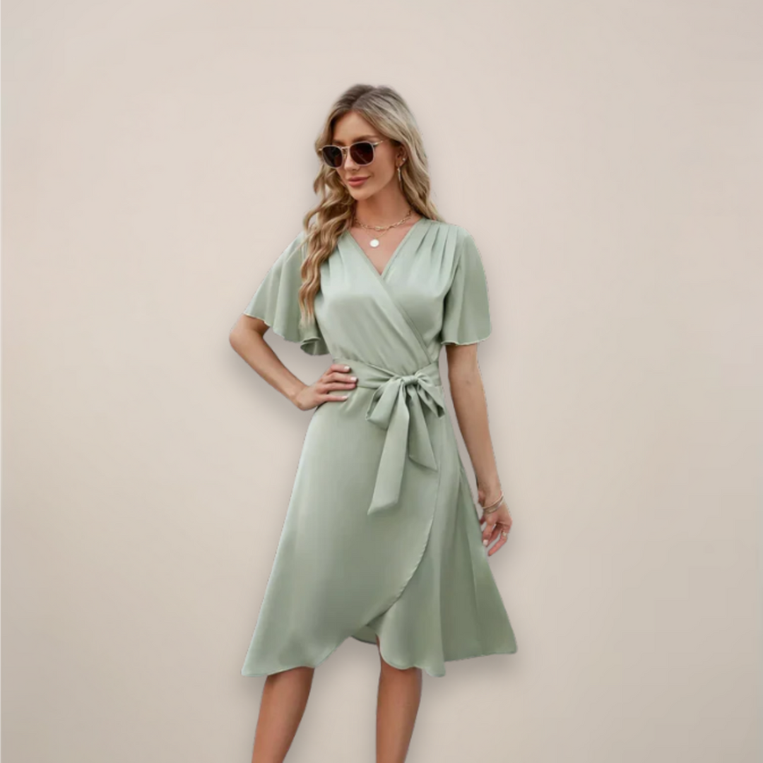 Front view of a women's elegant midi wrap dress, showcasing its flattering silhouette and chic front tie.