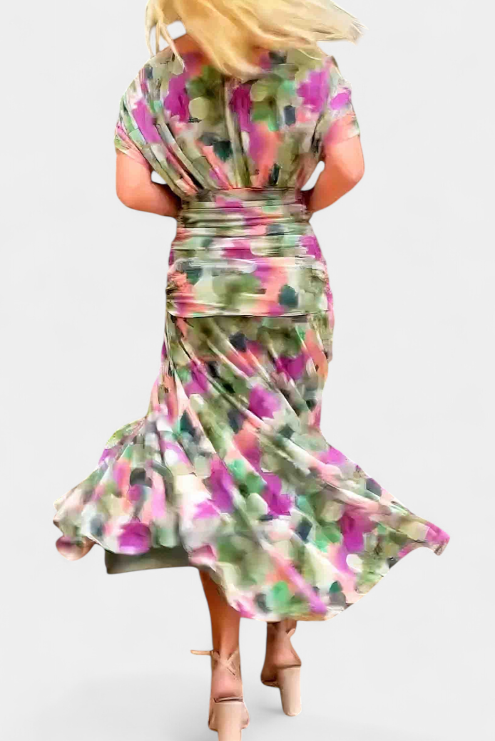 Flowy skirt of an elegant off-shoulder ruched maxi dress, perfect for a graceful silhouette