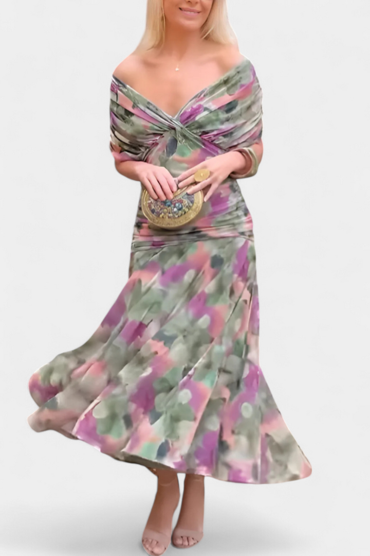 Close-up of ruched bodice on a women's elegant off-shoulder maxi dress, ideal for formal events